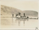 Image of Boats with supplies and men
